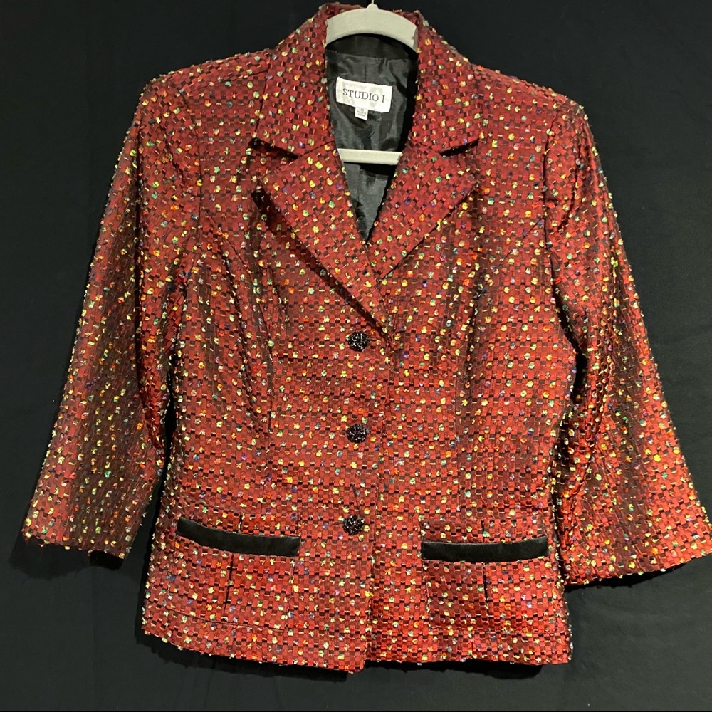 Size 10 Dressy jacket in burgundy satin with feathered fabric accents.
